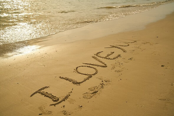 Miluju tě v písku